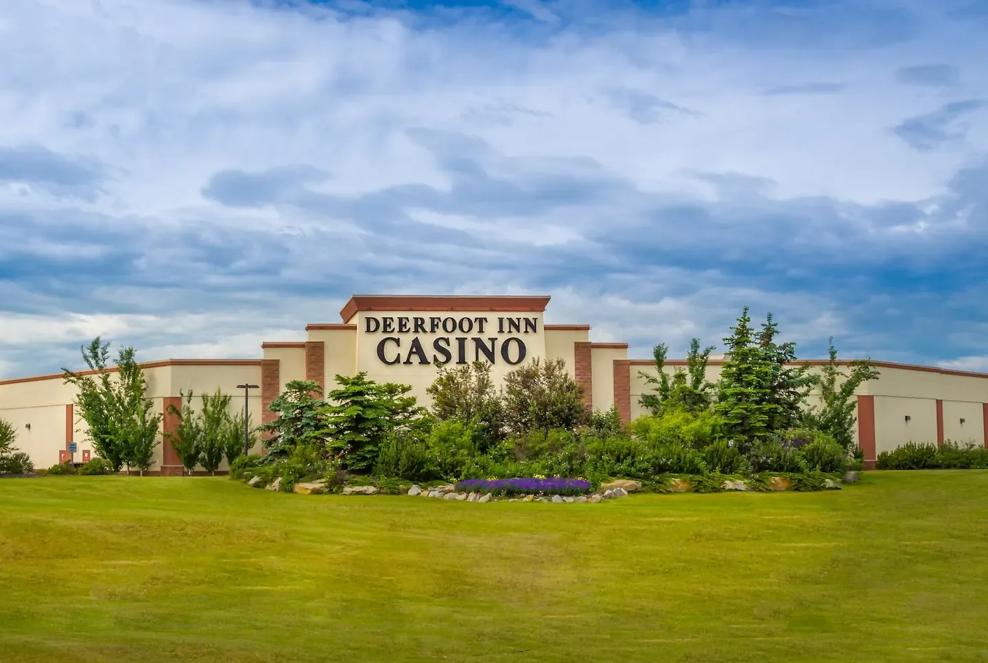 Hotel and casino building under open Alberta sky